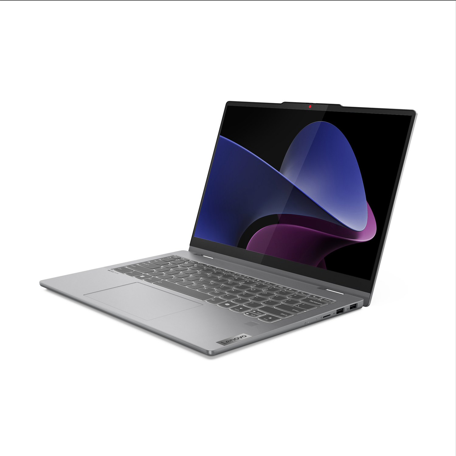 Un laptop Lenovo argentato aperto su sfondo bianco mostra uno sfondo astratto blu sullo schermo.