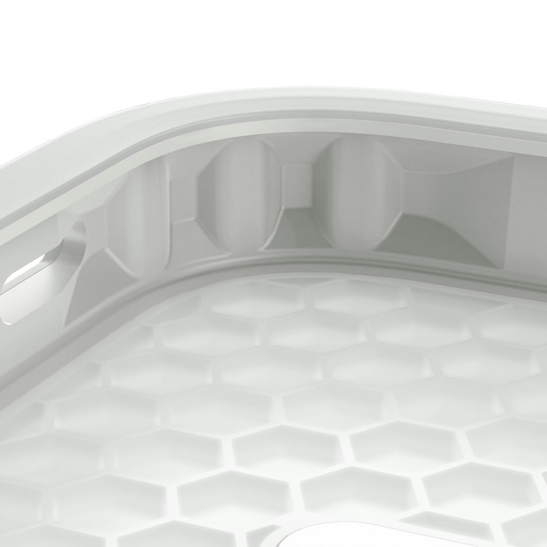 Nahaufnahme einer weißen Plastikbehälterecke mit einem inneren Wabenmuster und strukturellen Rippen.