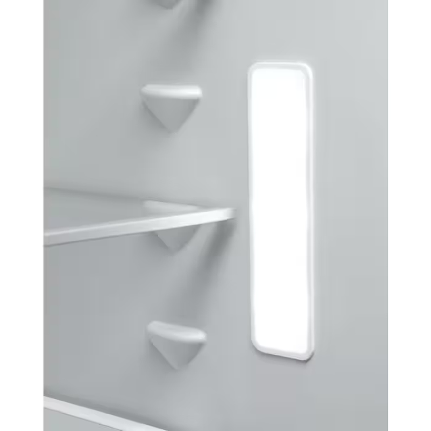 Inside of a refrigerator with a bright LED strip, glass shelves, and white supports against a grey wall.