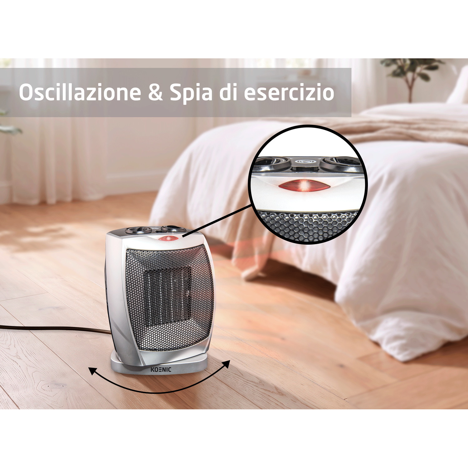 Termoventilatore oscillante argentato su pavimento in legno con spia rossa, con letto sullo sfondo.