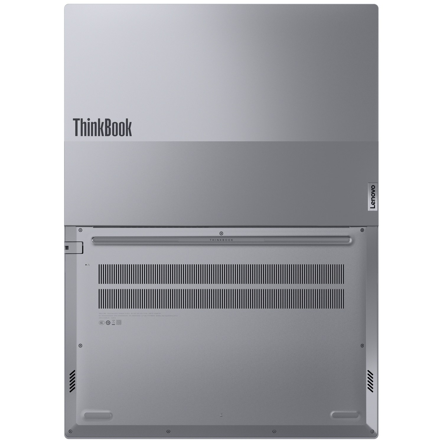 De onderkant van een grijze Lenovo ThinkBook laptop met koelgleuven, schroeven en merklogo's.