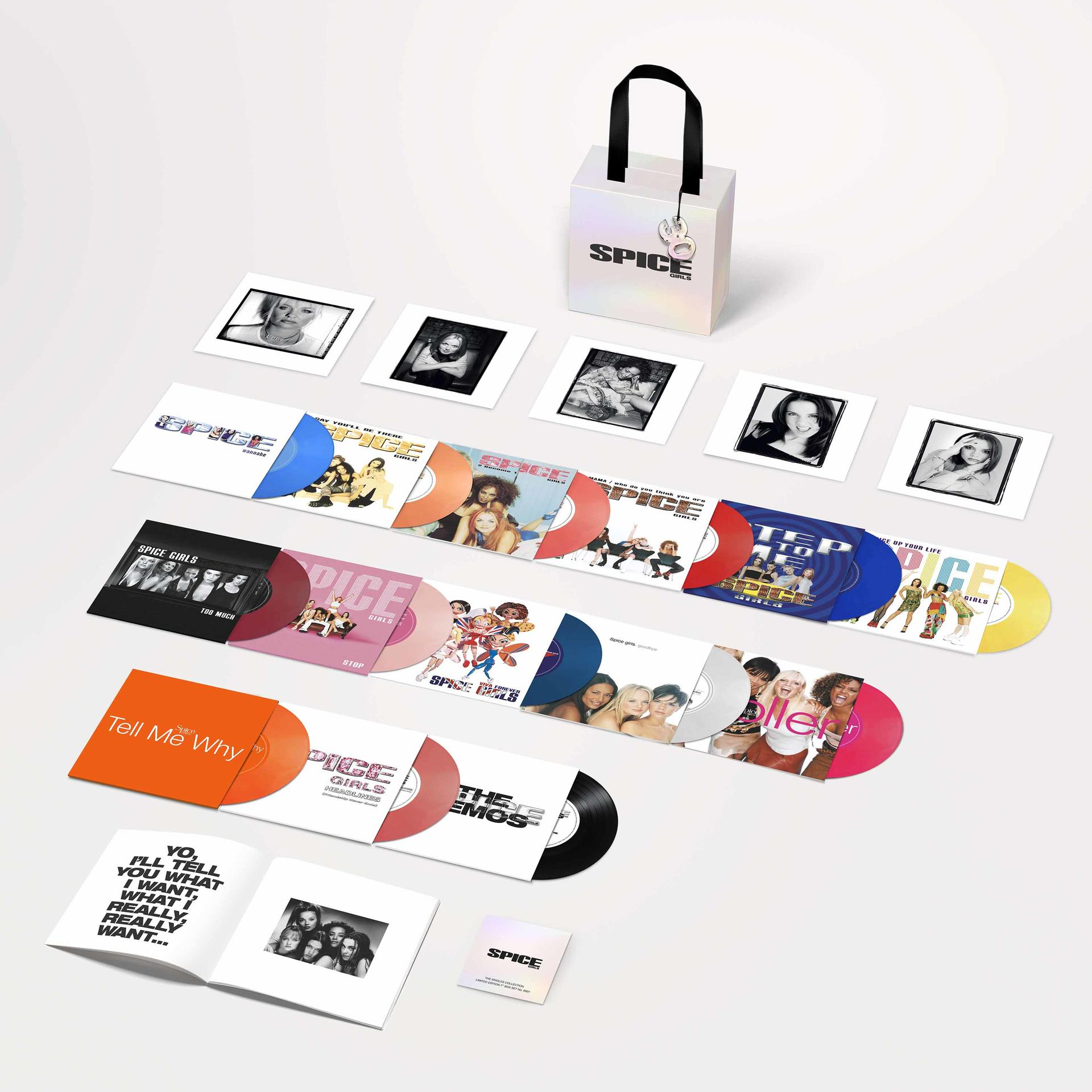 Ein Spice-Girls-Box-Set mit bunten Vinyl-Schallplatten, Hüllen, Fotodrucken, einem offenen Textbuch und einer Tasche.