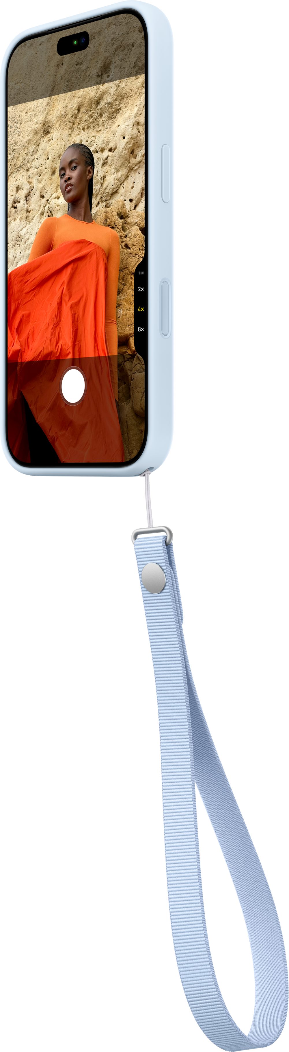 Un smartphone bleu clair avec lanière affiche une femme en orange devant une paroi rocheuse.