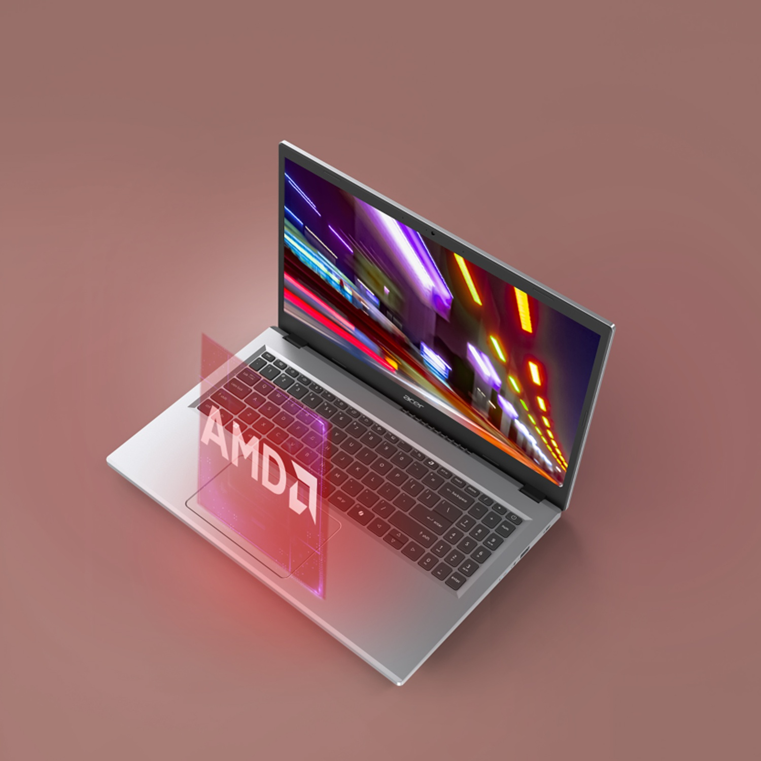 Un laptop argentato su sfondo marrone con un ologramma AMD rosso sopra la tastiera e strisce colorate sullo schermo.