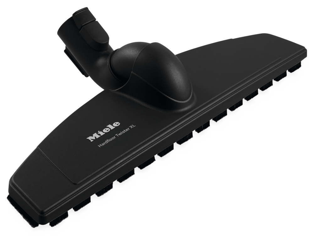 Schwarze Miele Hardfloor Twister XL Staubsaugerbürste vor schwarzem Hintergrund.