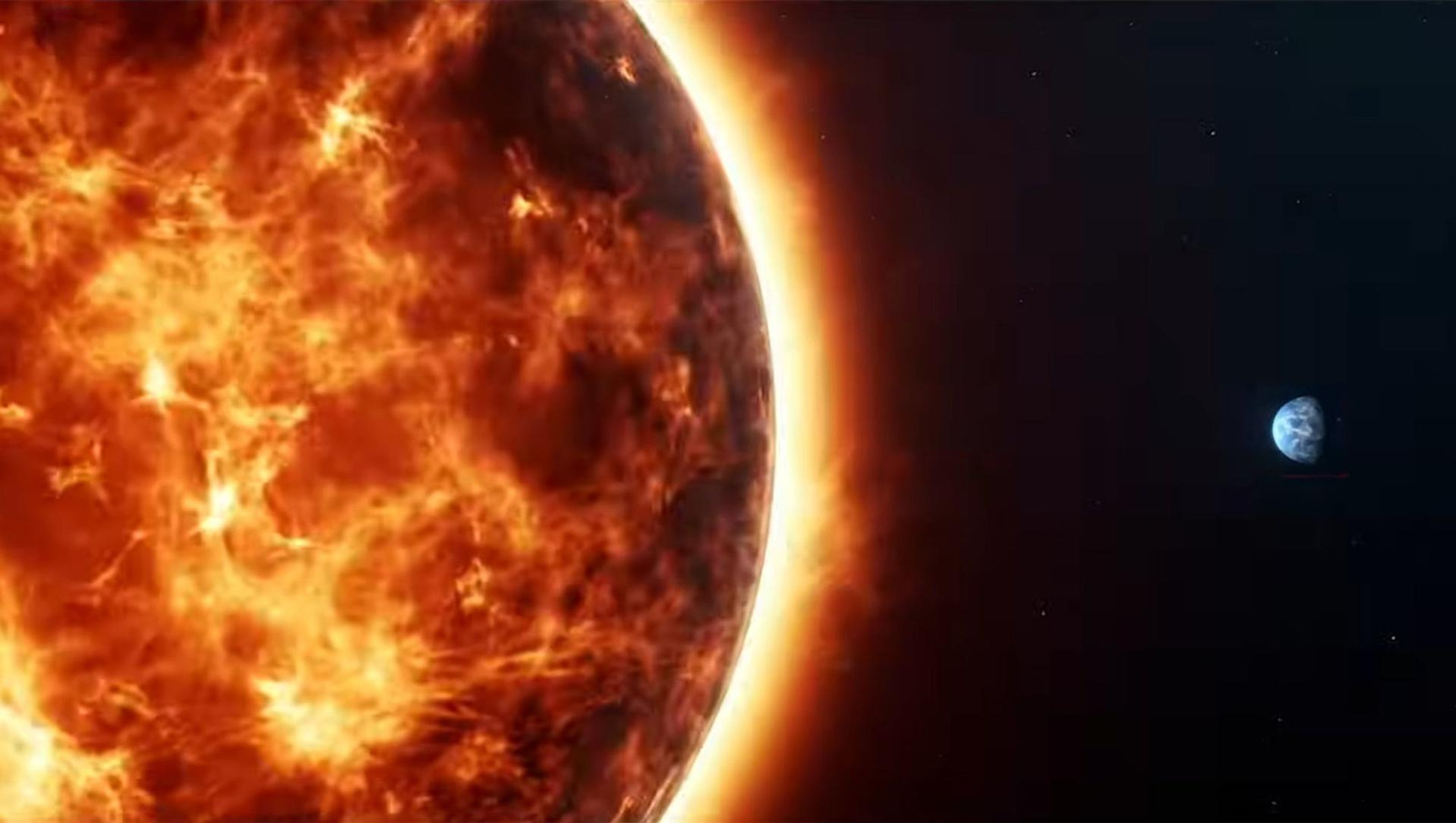 Riesige, flammende Sonne im Vordergrund und winzige Erde im weiten Weltraum.