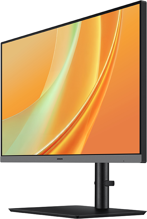 Egy fekete Samsung számítógép-monitor állványon, narancssárga absztrakt képernyővédővel.