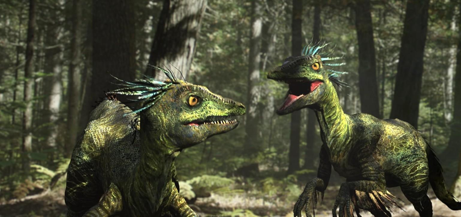 Zwei grüne gefiederte Dinosaurier stehen im hellen Wald.