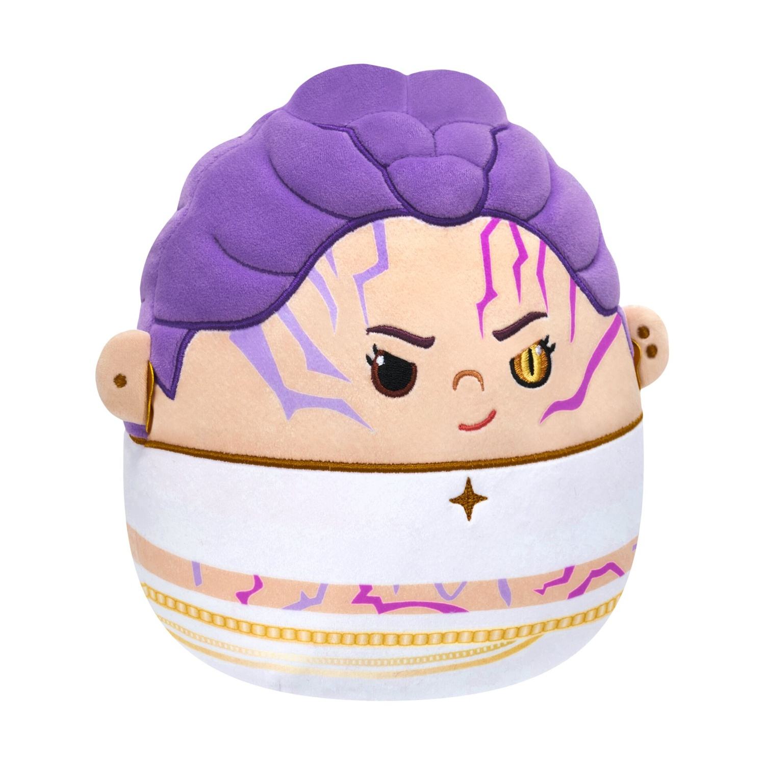 Un peluche rotondo con capelli viola, segni sul viso viola, un occhio giallo e abiti bianchi e dorati.