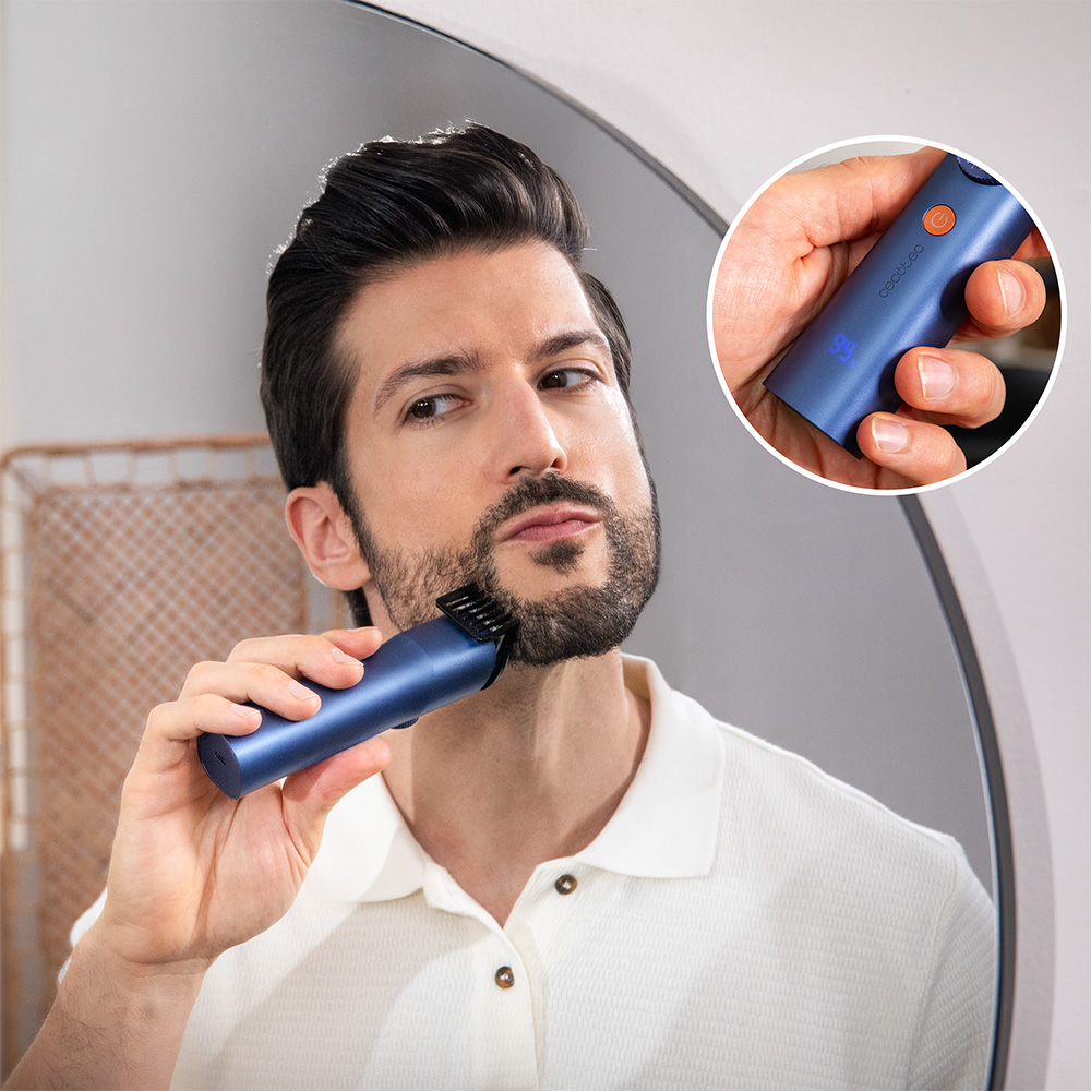 Un hombre se recorta la barba con una recortadora eléctrica azul. Un círculo muestra un primer plano de la recortadora en la mano.