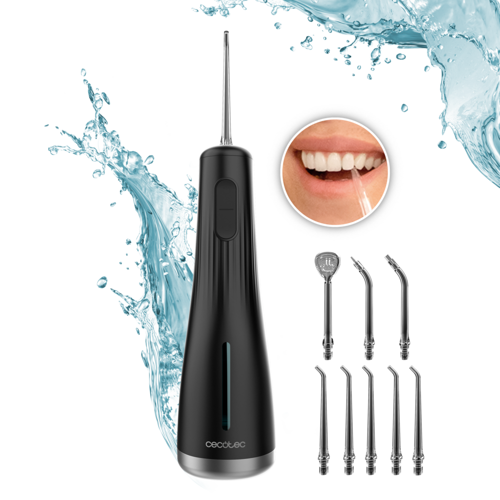 Irrigador dental negro con salpicaduras de agua, boquillas intercambiables y detalle de limpieza dental.