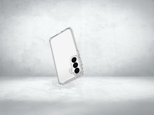 Un teléfono inteligente en una funda protectora transparente flota sobre una superficie de hormigón gris.