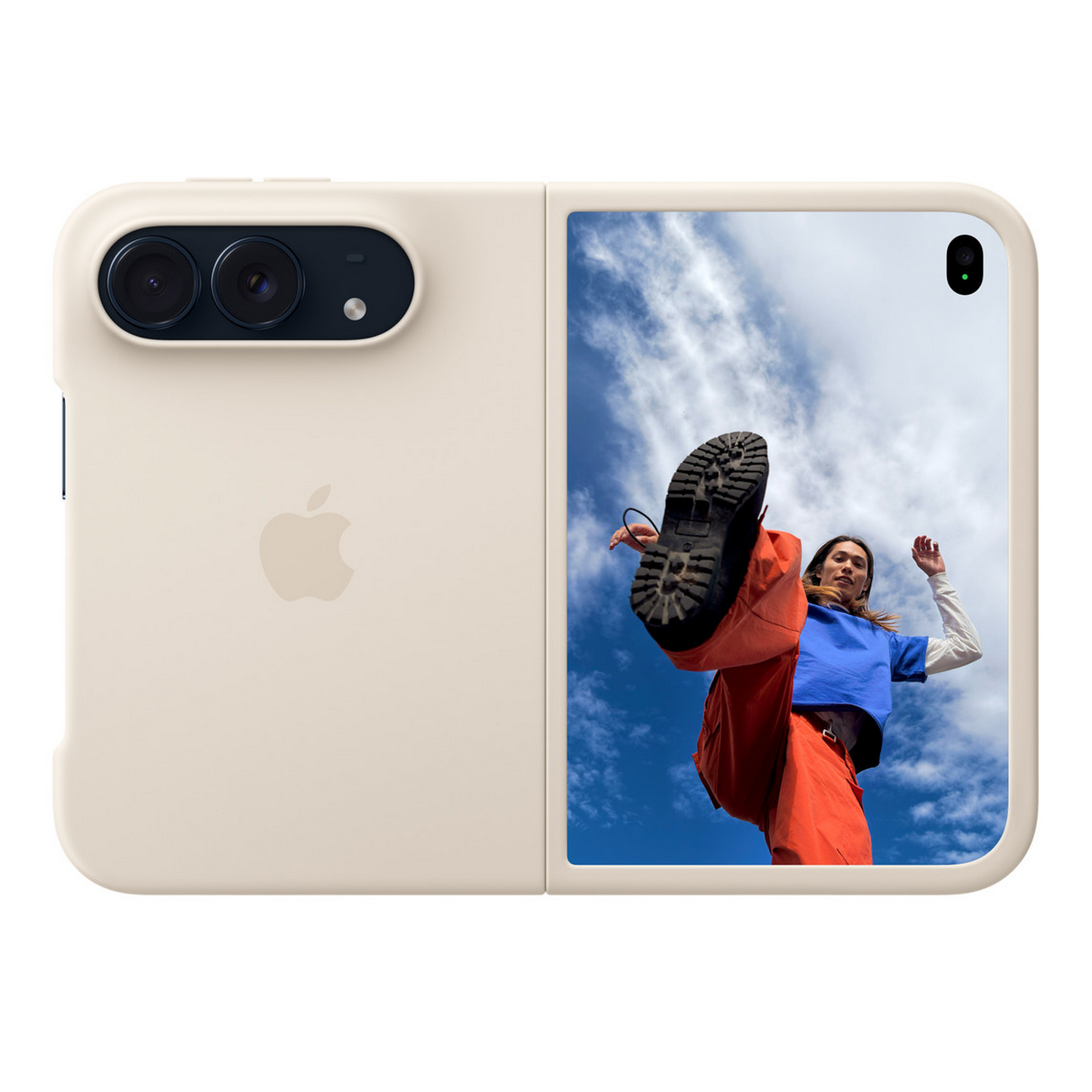 Smartphone plegable beige que muestra a una persona pateando hacia la cámara contra un cielo azul nublado.