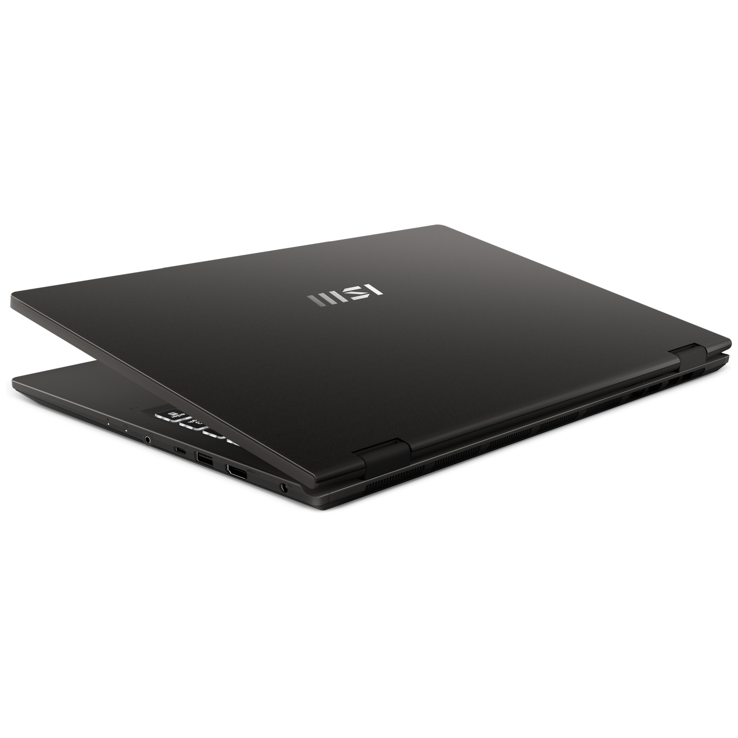 Un ordinateur portable MSI noir fermé sur fond blanc, légèrement ouvert sur le côté.