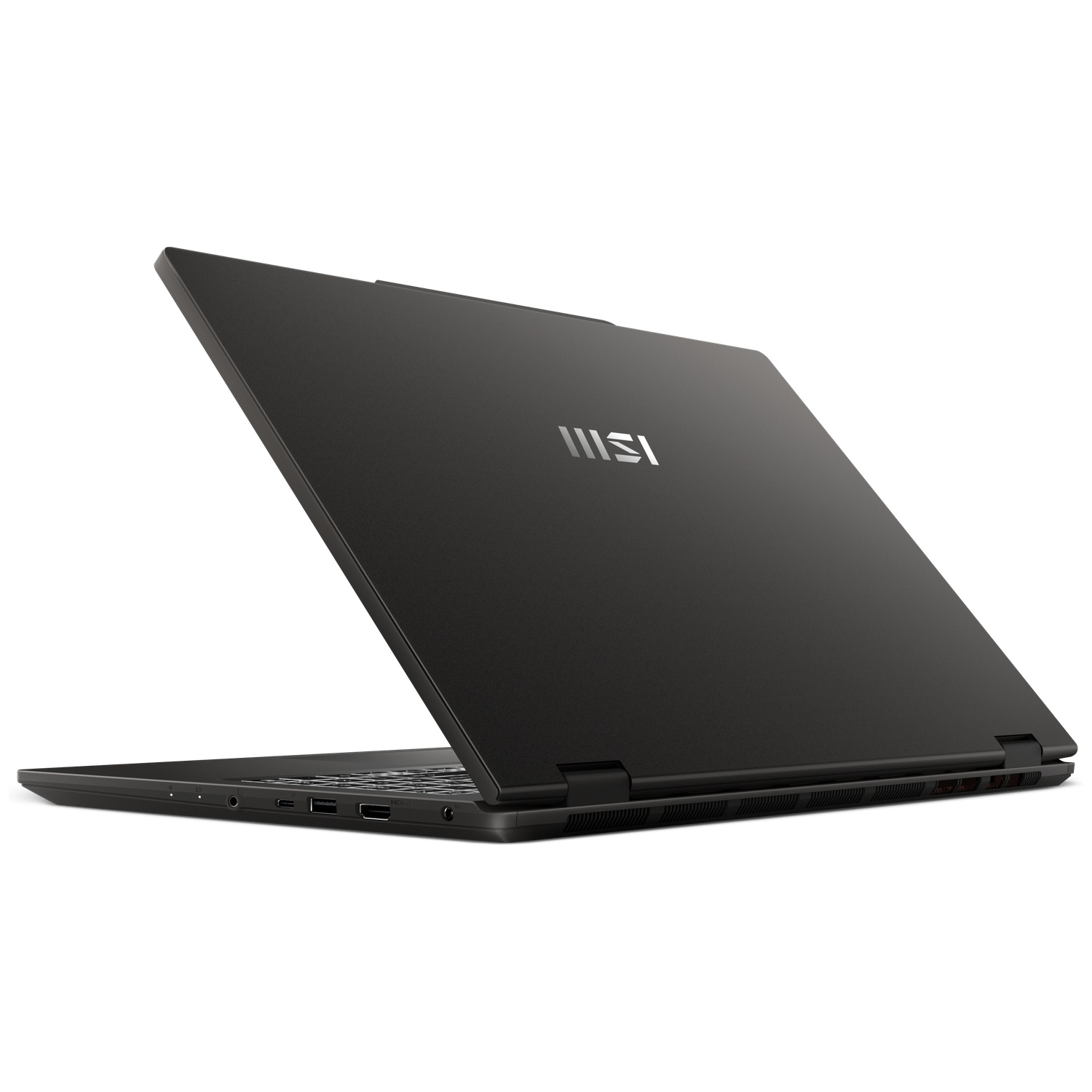 Un ordinateur portable MSI noir sur fond blanc, montrant le capot arrière fermé avec un logo argenté.