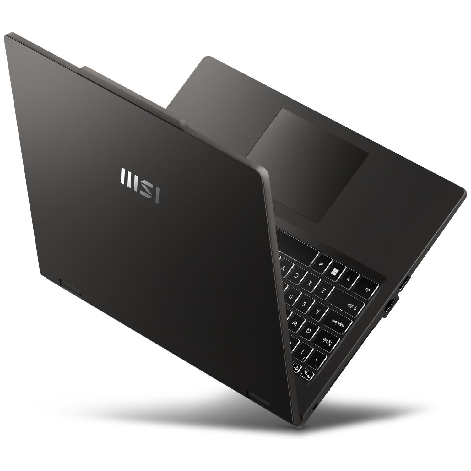 Un ordinateur portable MSI noir légèrement ouvert sur fond blanc, montrant le logo.