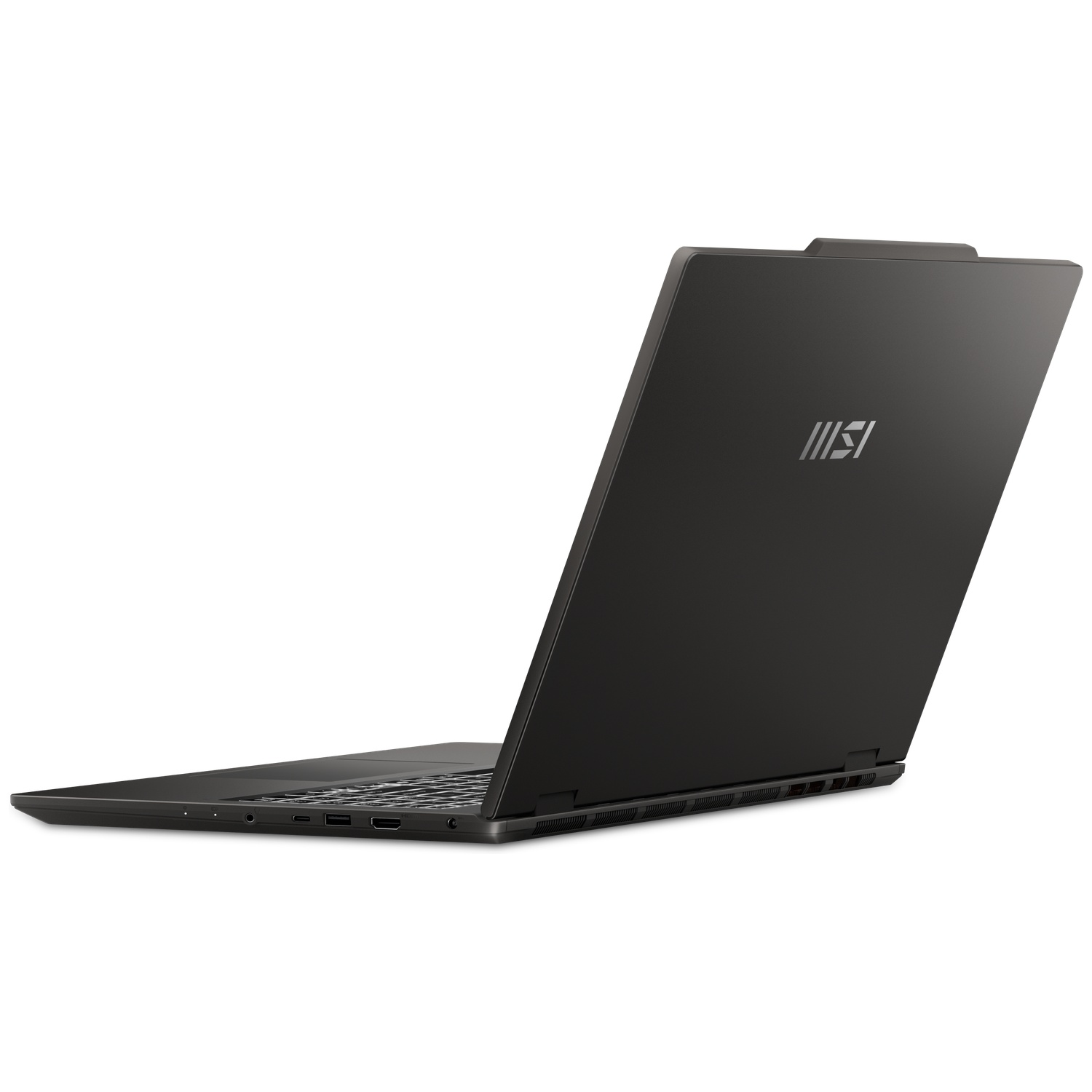 Un ordinateur portable noir repose sur une surface blanche, montrant son couvercle arrière fermé avec un logo.