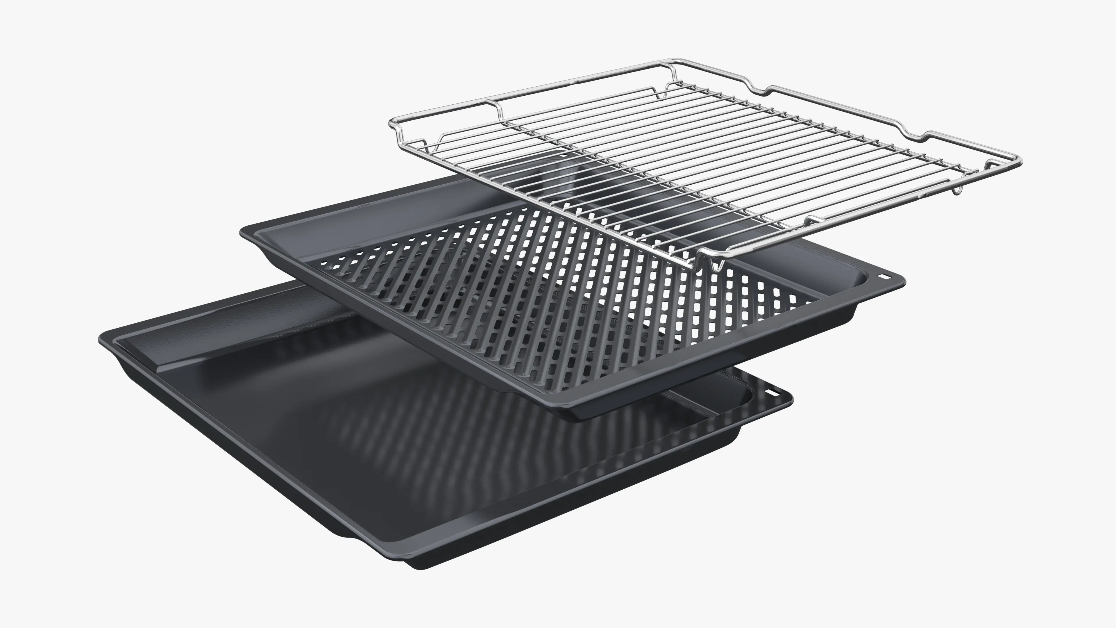 Una rejilla de horno de metal, una bandeja de horno perforada y una bandeja negra sólida.