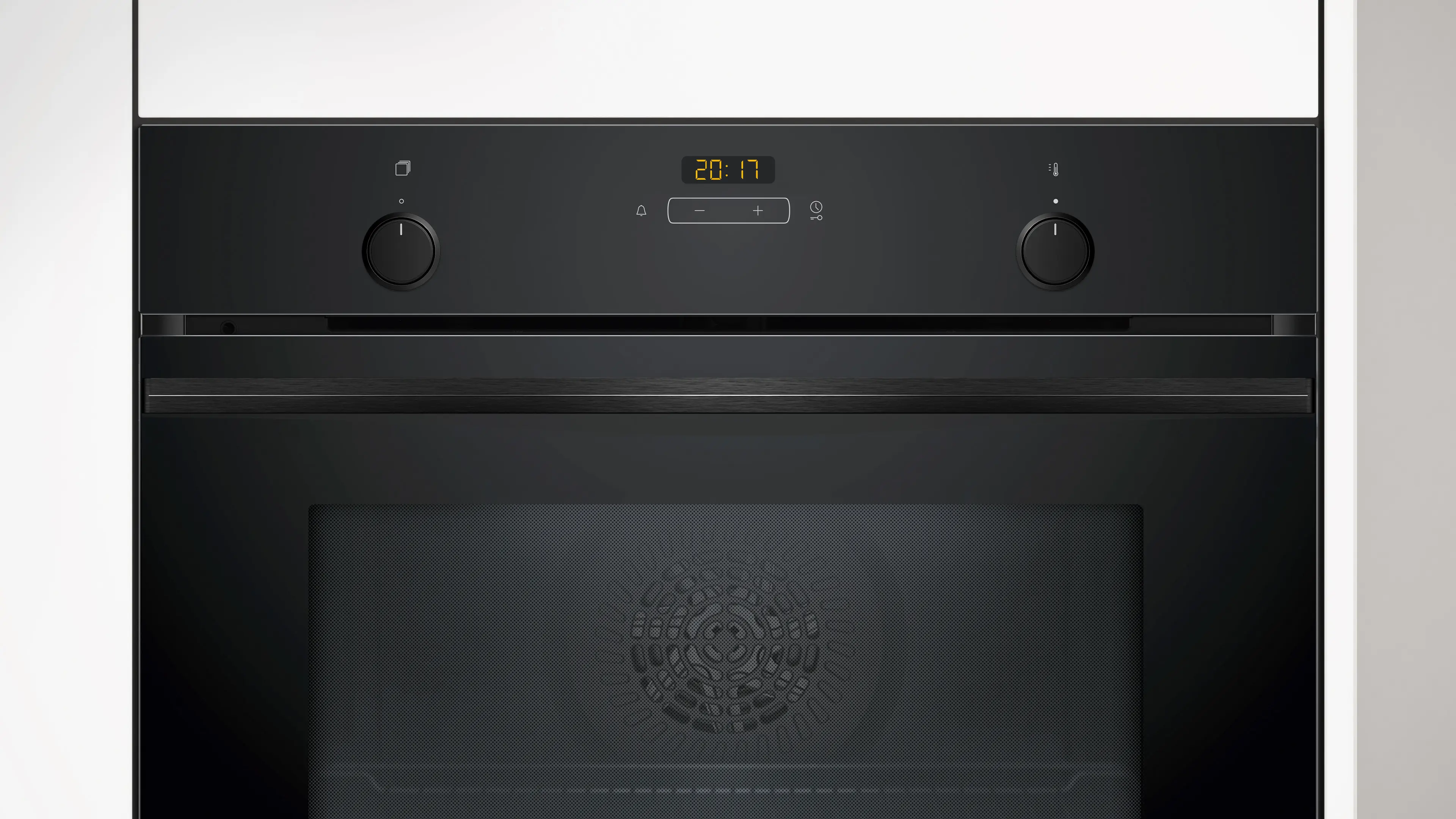 Un horno negro con pantalla digital, dos perillas redondas y puerta de vidrio con un patrón.