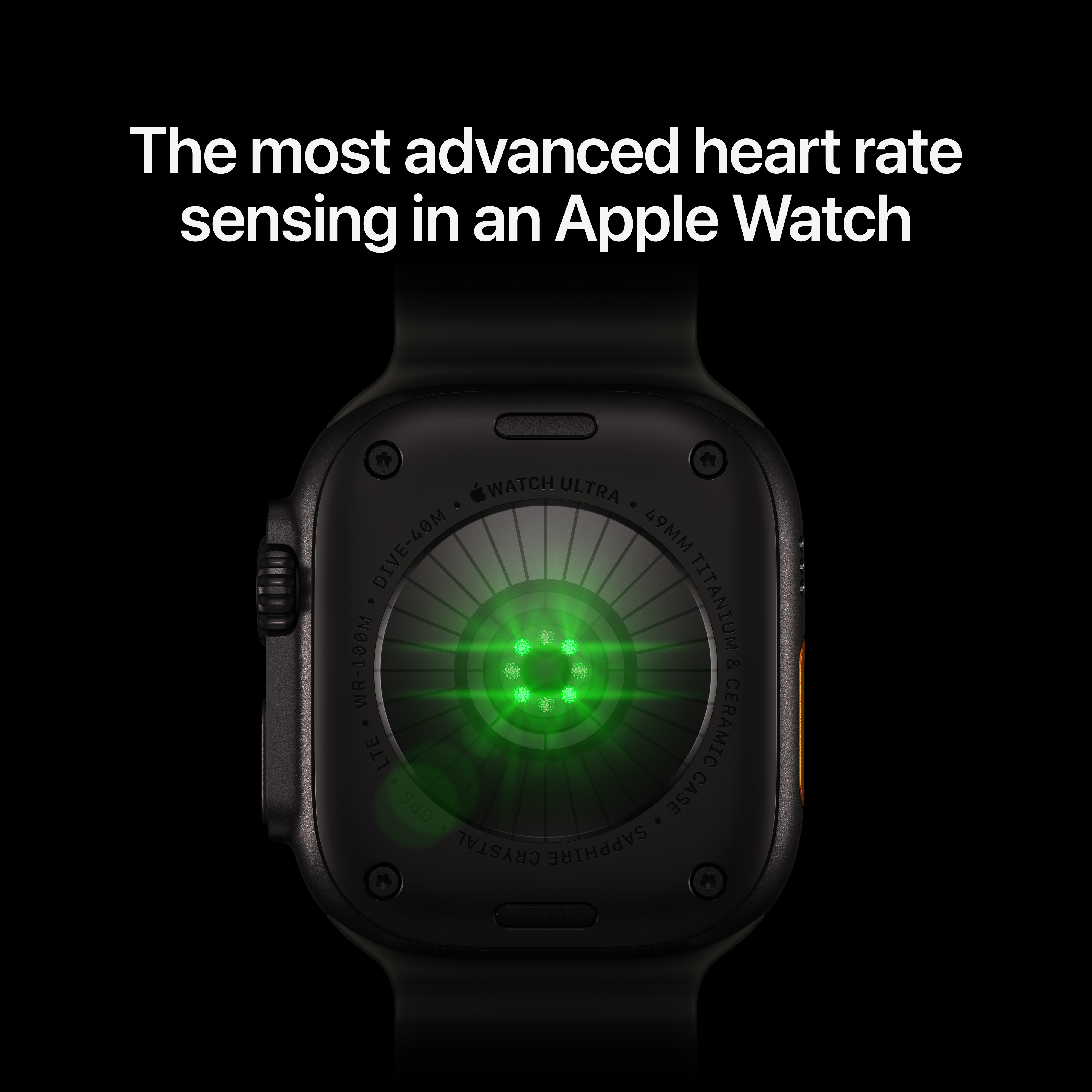 Egy Apple Watch Ultra hátulja világító zöld pulzusmérő szenzorokkal és a 'The most advanced heart rate' felirattal.