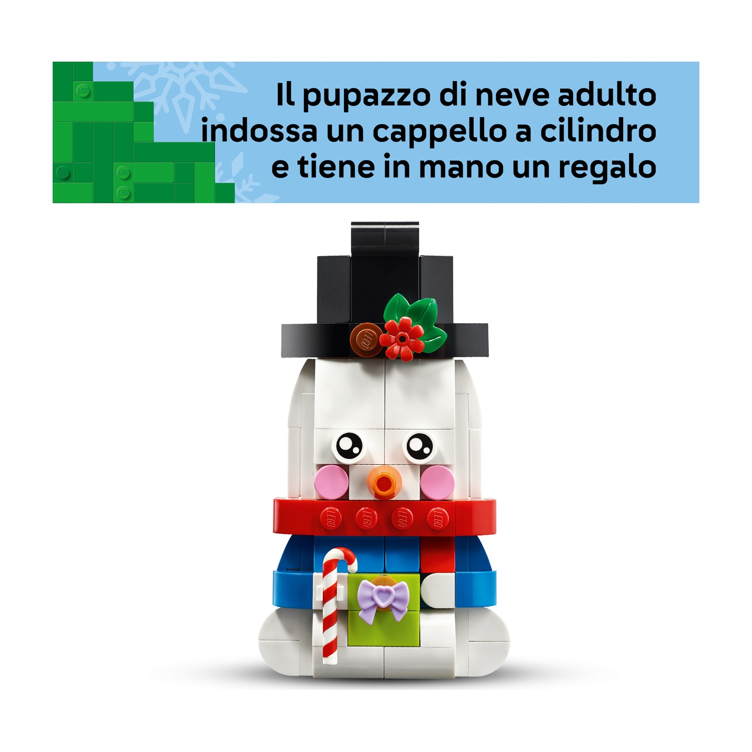 Pupazzo di neve Lego con cilindro, sciarpa rossa, regalo e bastoncino di zucchero.