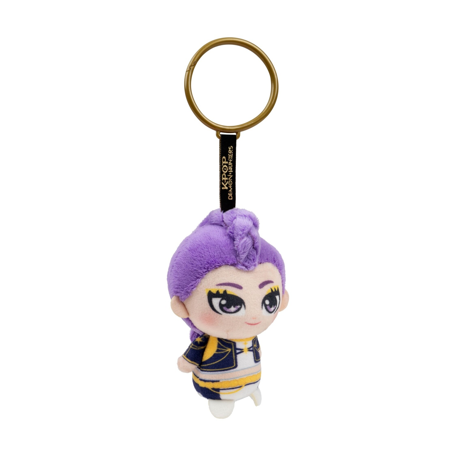 Portachiavi di peluche con un personaggio dai capelli viola, grandi occhi e abbigliamento blu e giallo.