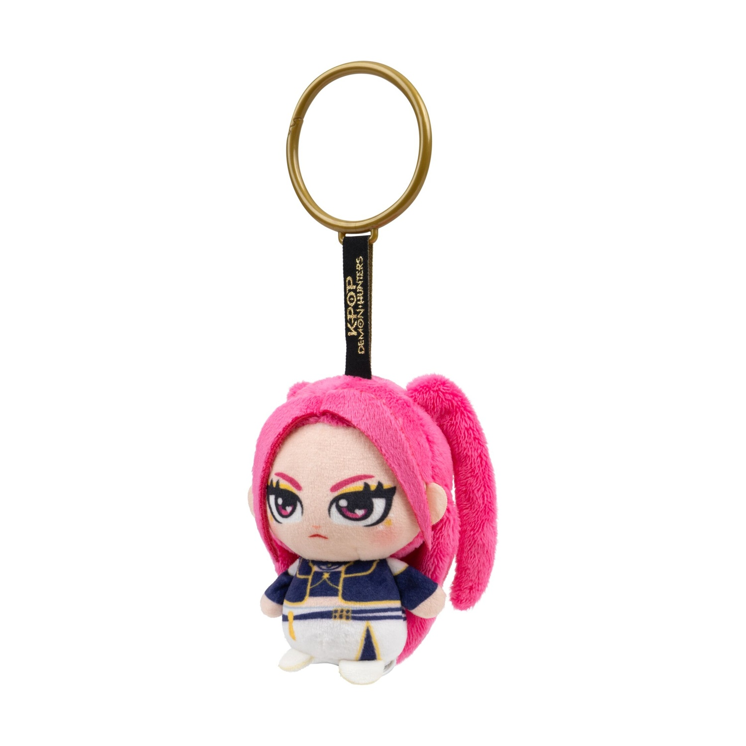 Portachiavi in peluche di un personaggio con capelli rosa vivo, occhi grandi e vestito blu e bianco.