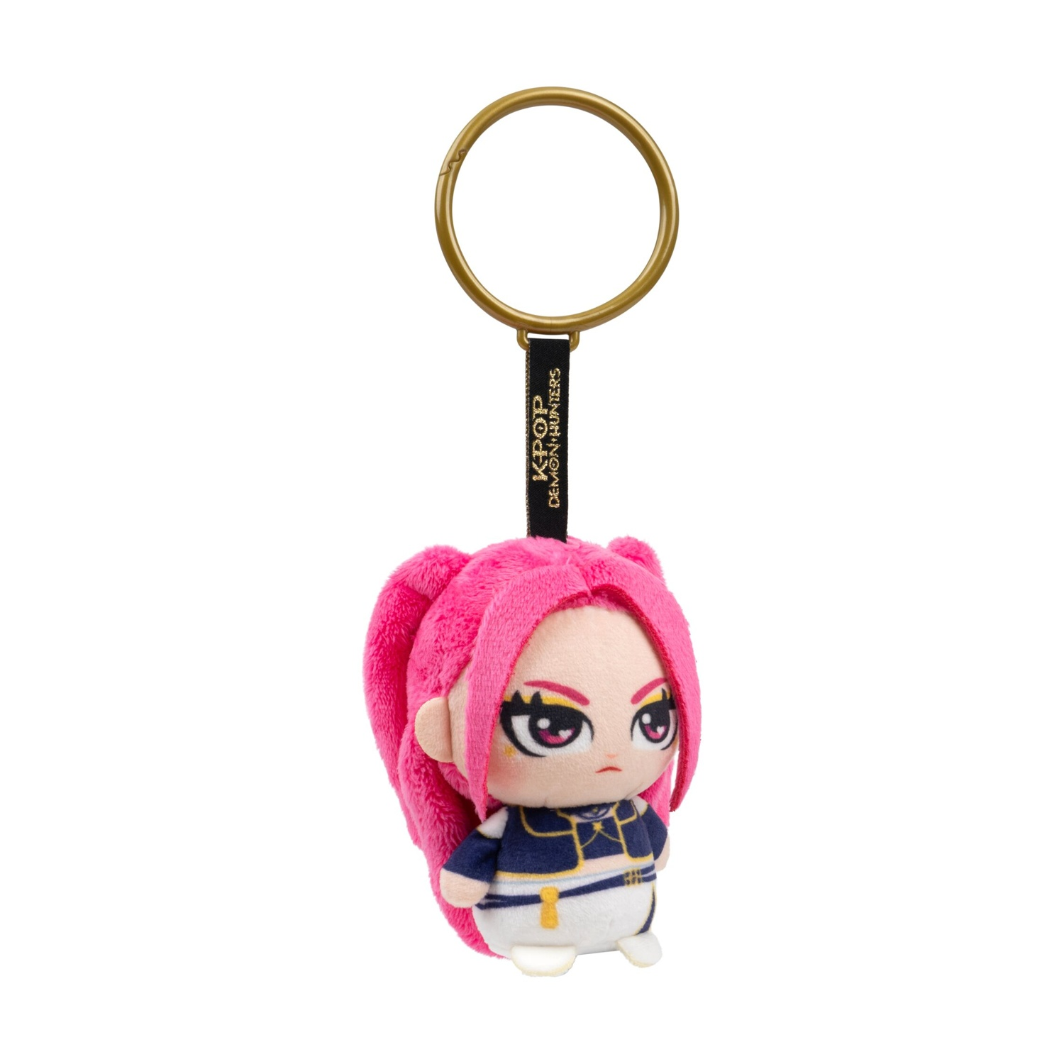 Portachiavi in peluche con personaggio dai capelli rosa, grandi occhi e abiti blu.