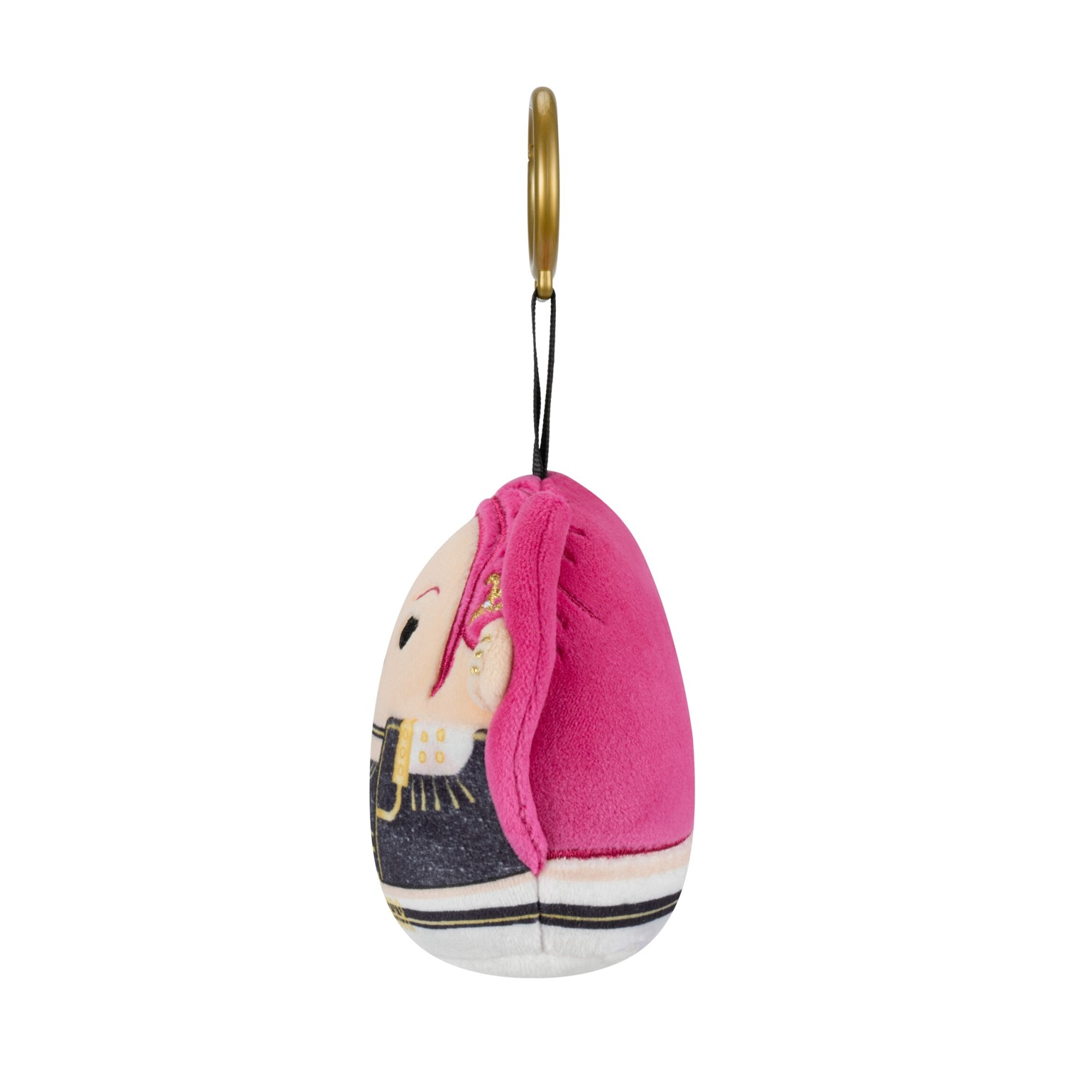 Vista laterale di un peluche con capelli rosa e anello dorato.