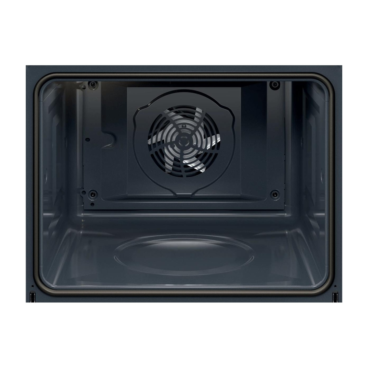 L'interno di una cavità del forno scura con una ventola a convezione sul pannello posteriore e una guarnizione.