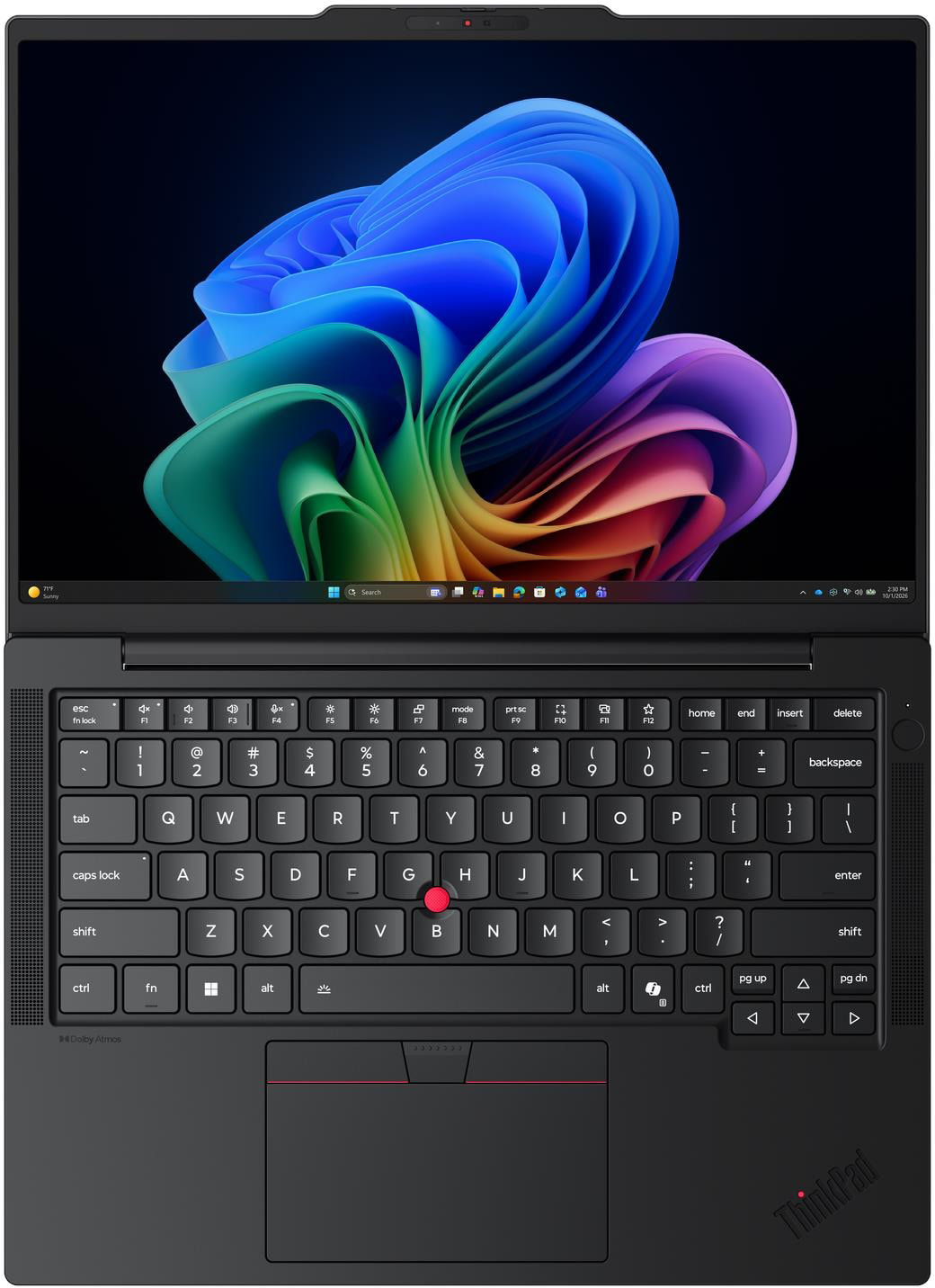 Egy fekete laptop kék és lila absztrakt háttérképet mutat, látható QWERTY billentyűzettel és érintőpaddal.