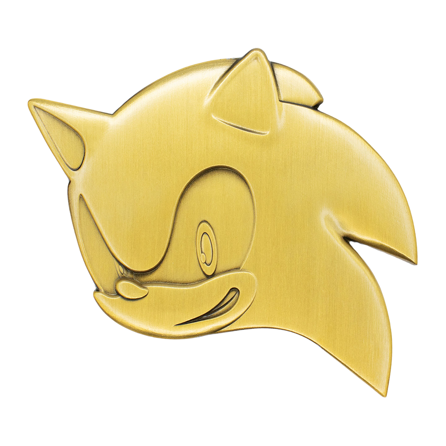 Emblema en relieve de color dorado de la cabeza de Sonic sobre fondo negro.