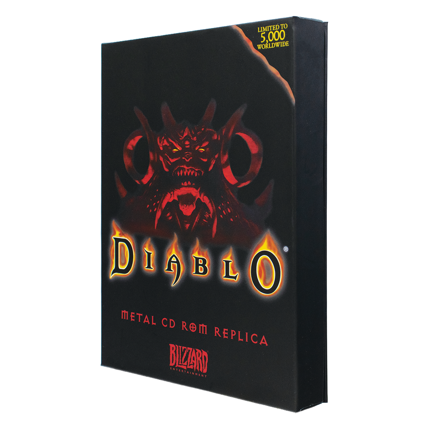 Caja réplica de CD ROM de Diablo en metal negro con cara de diablo roja y logo de fuego amarillo.