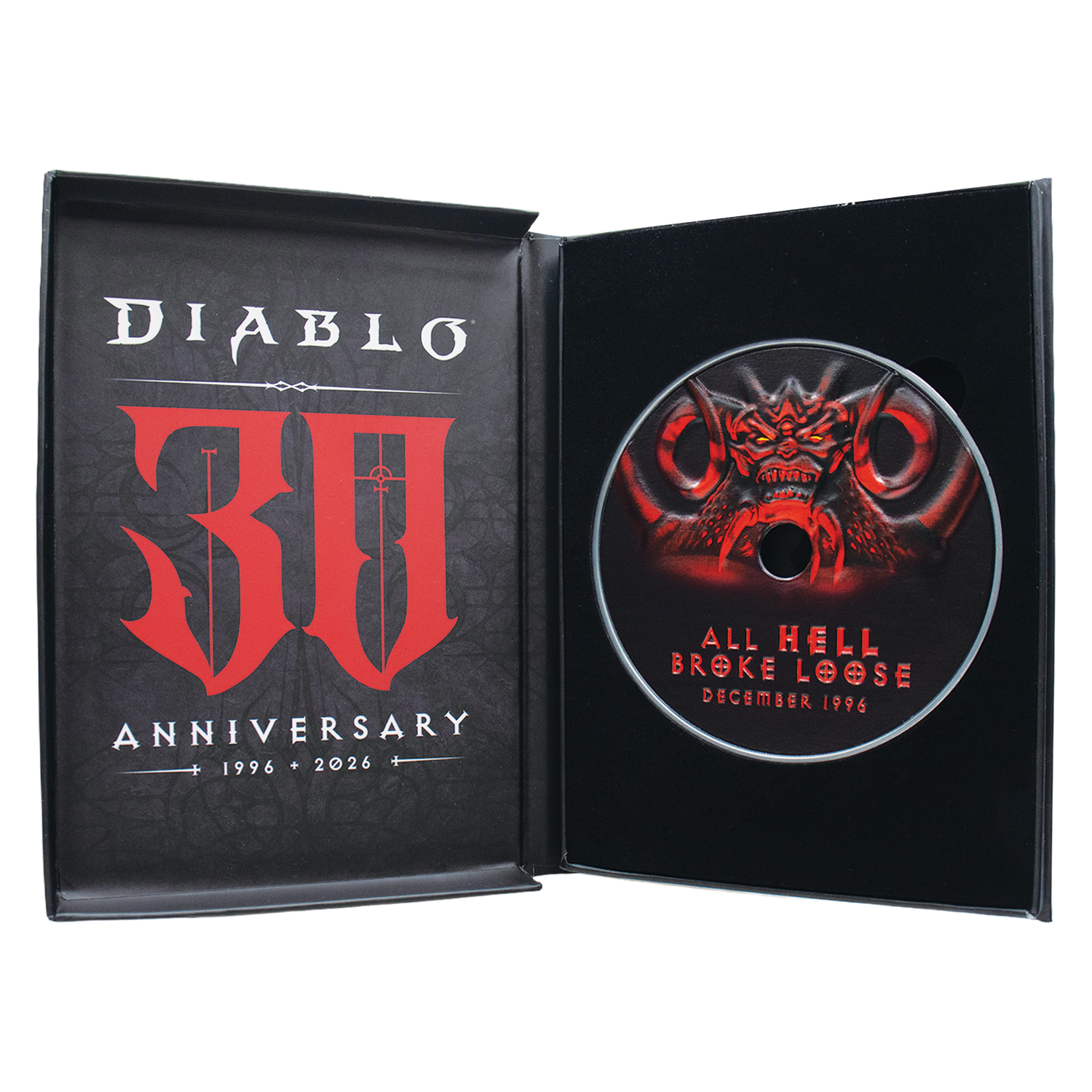 Caja de CD abierta del 30 aniversario de Diablo con logo rojo a la izquierda y gráfico de demonio en el CD.