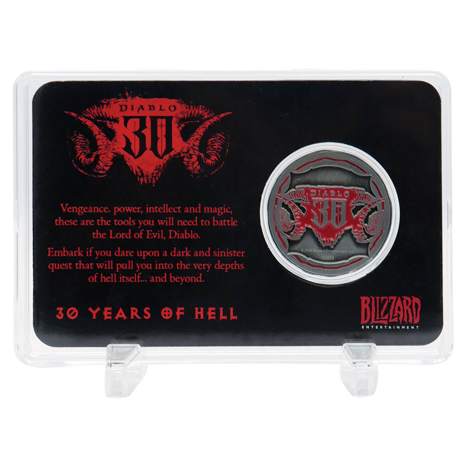 Una moneda coleccionable de Diablo en estuche acrílico con logotipo rojo y texto.