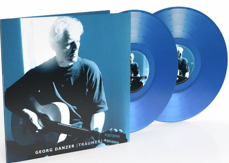 Blaue Vinyl-Doppel-LP mit Cover eines sitzenden Gitarristen.