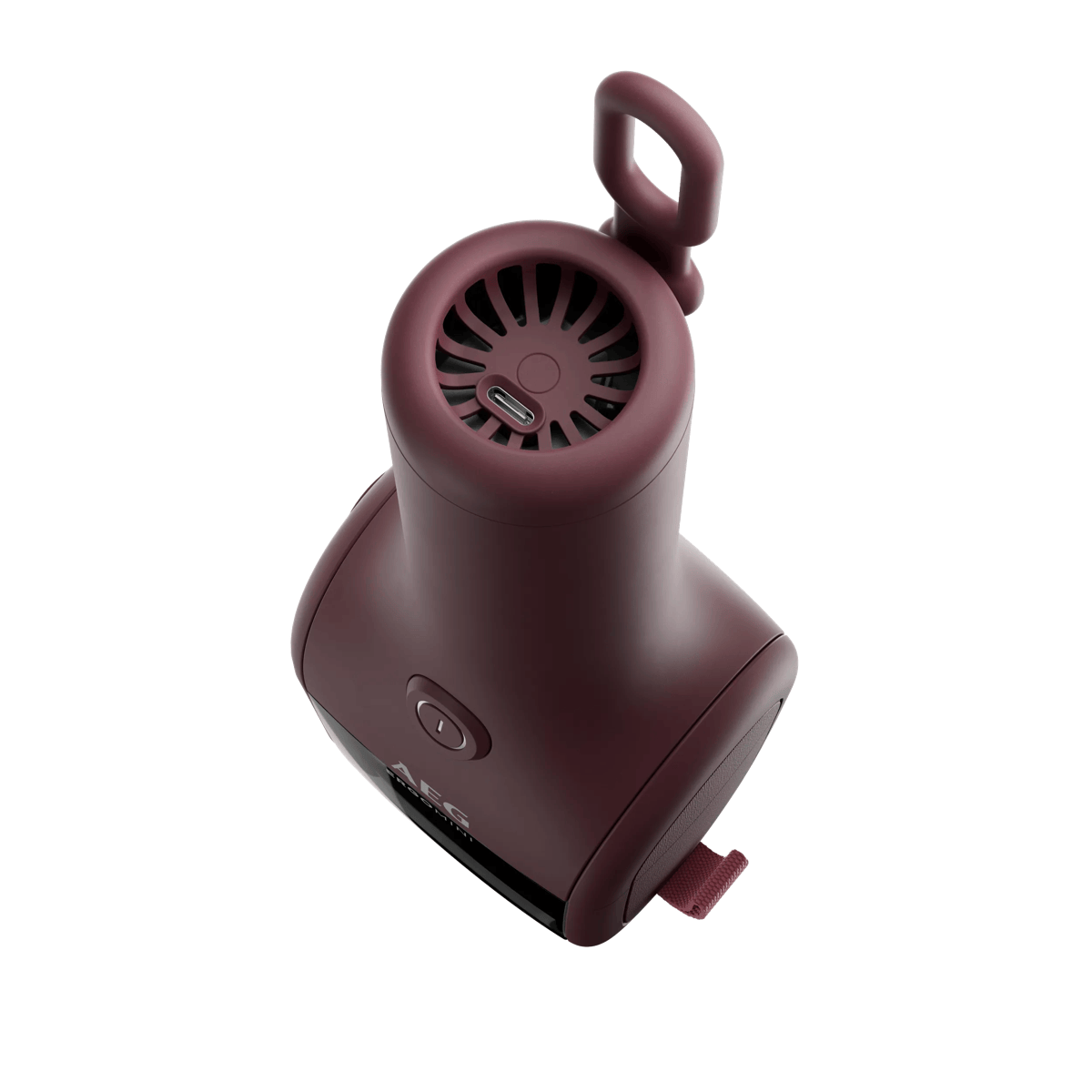 Ein weinroter AEG Mini Staubsauger mit Hängeöse und USB-C-Anschluss auf weißem Grund.