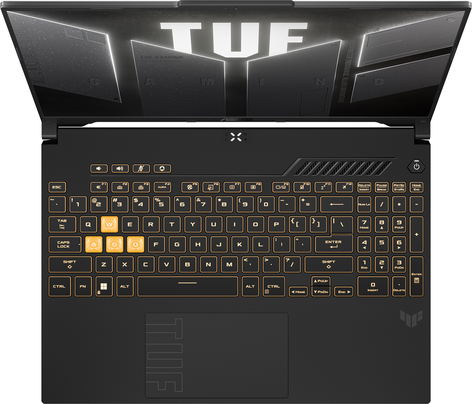 Felnőtt nézet egy fekete Asus TUF laptopról megvilágított billentyűzettel, narancssárga WASD gombokkal.