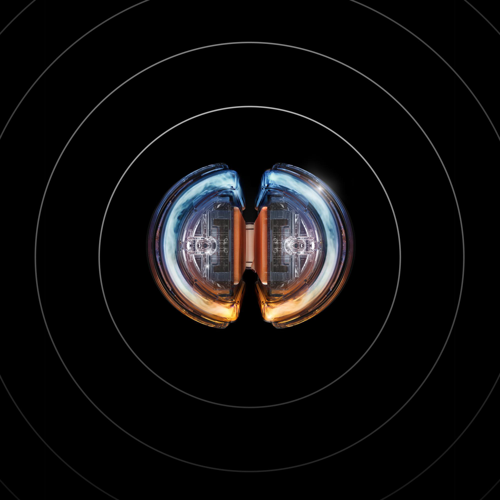 Ein futuristisches, zweiteiliges technisches Gerät vor einem schwarzen Hintergrund mit konzentrischen Ringen.