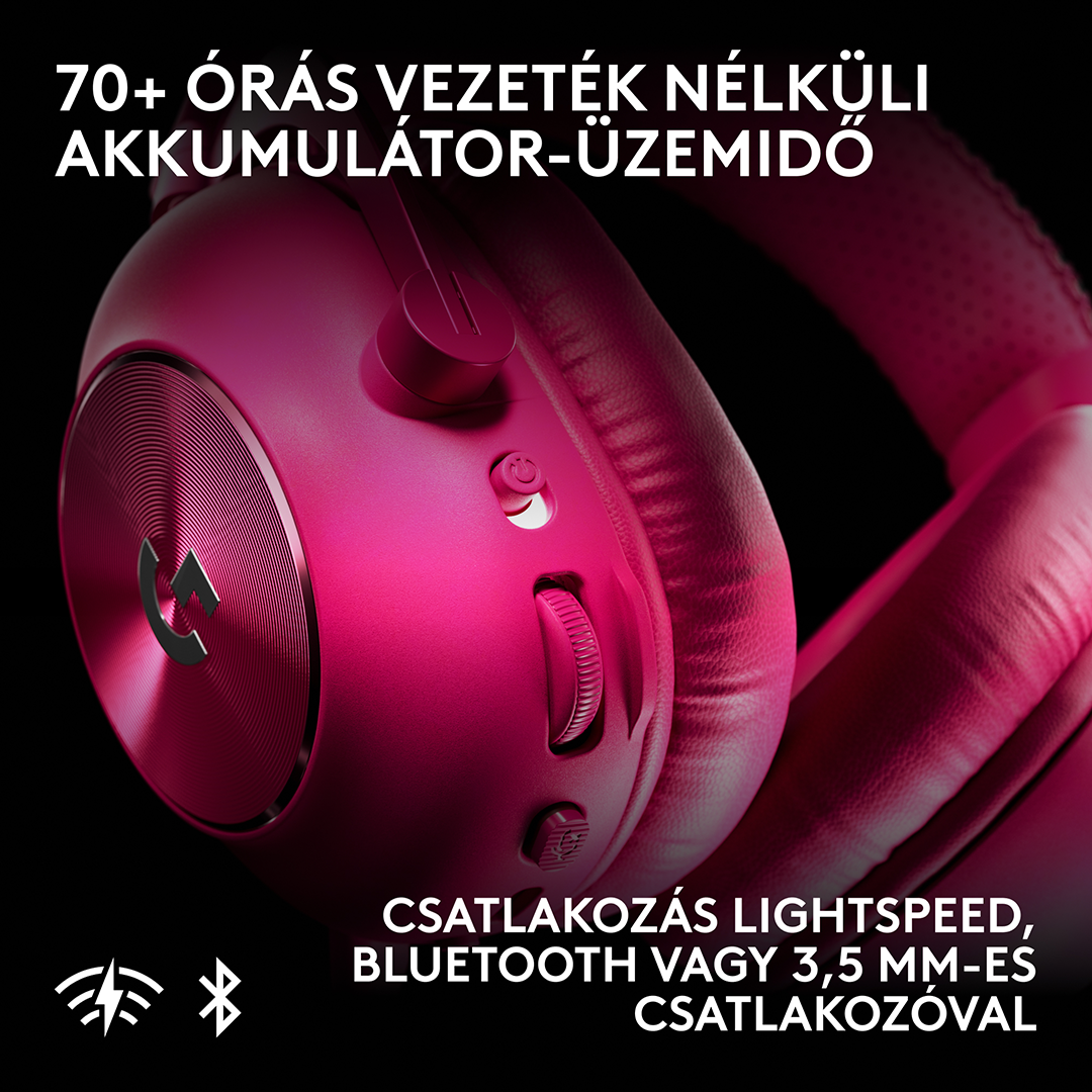 Kozelkep rozsaszin vezetek nelkuli gamer fejhallturol gombokkal es hangeroszabalyzoval fekete hatteren.
