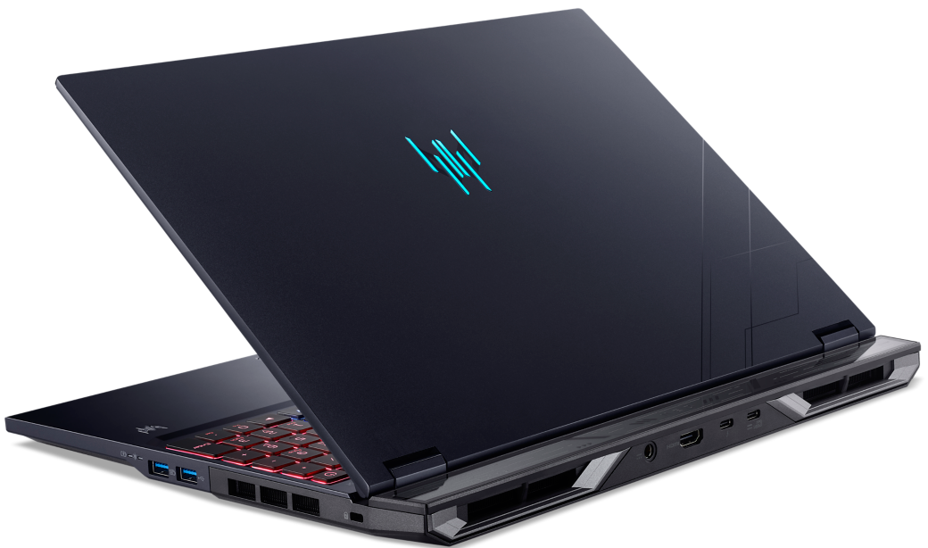 Egy fekete gamer laptop két világító kék logóval a fedélen és háttérvilágítású billentyűzettel.