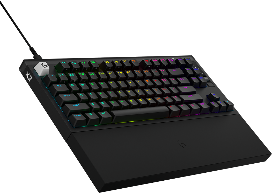 Fekete mechanikus billentyűzet RGB háttérvilágítással és csuklótámasszal sötét háttér előtt.