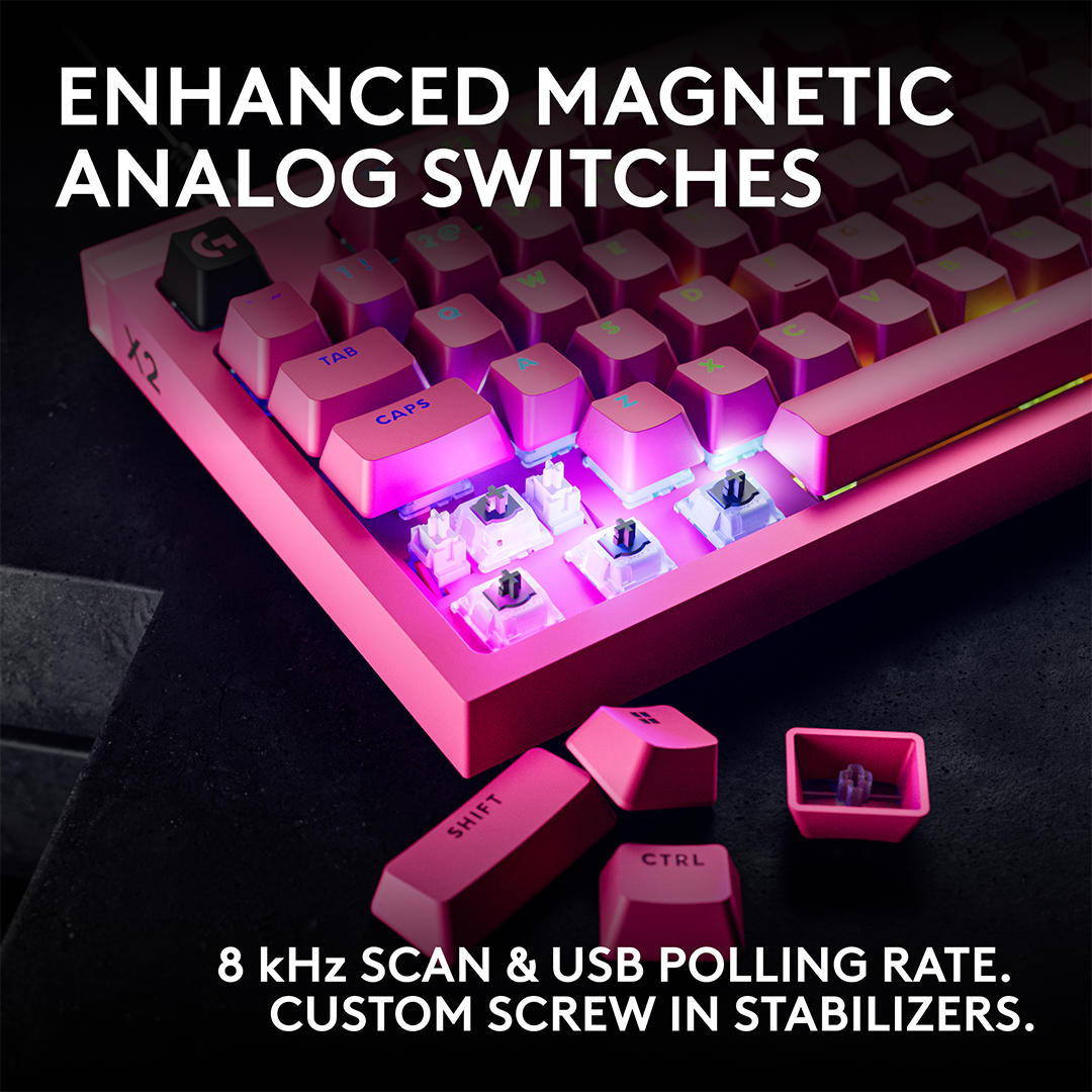 Rózsaszín játékbillentyűzet eltávolított billentyűsapkákkal, melyek alól mágneses kapcsolók látszanak.