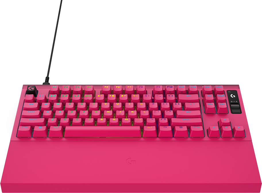 Élénk rózsaszín gamer billentyűzet RGB világítással és csuklótámasszal fekete háttérrel.
