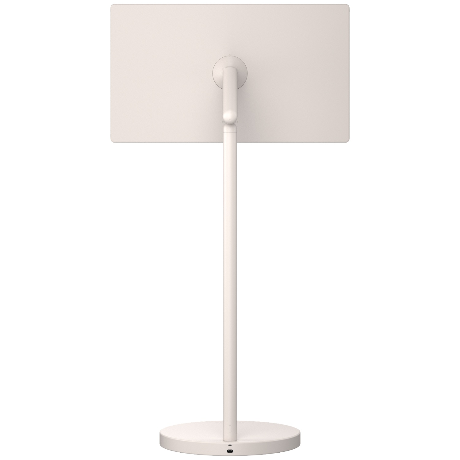 Rear view of a cream-white monitor on a stand with a round base against a white background.