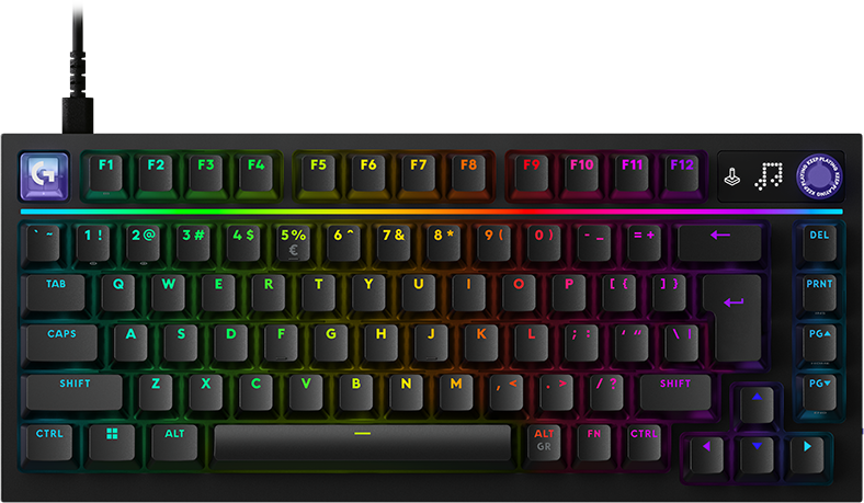 Fekete mechanikus billentyűzet élénk RGB háttérvilágítással, sötét háttér előtt.