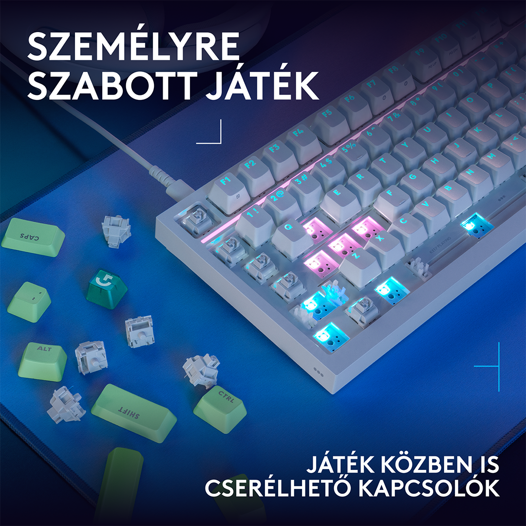 Mechanikus billentyűzet eltávolított billentyűkkel és világító kapcsolókkal egy kék alátéten.