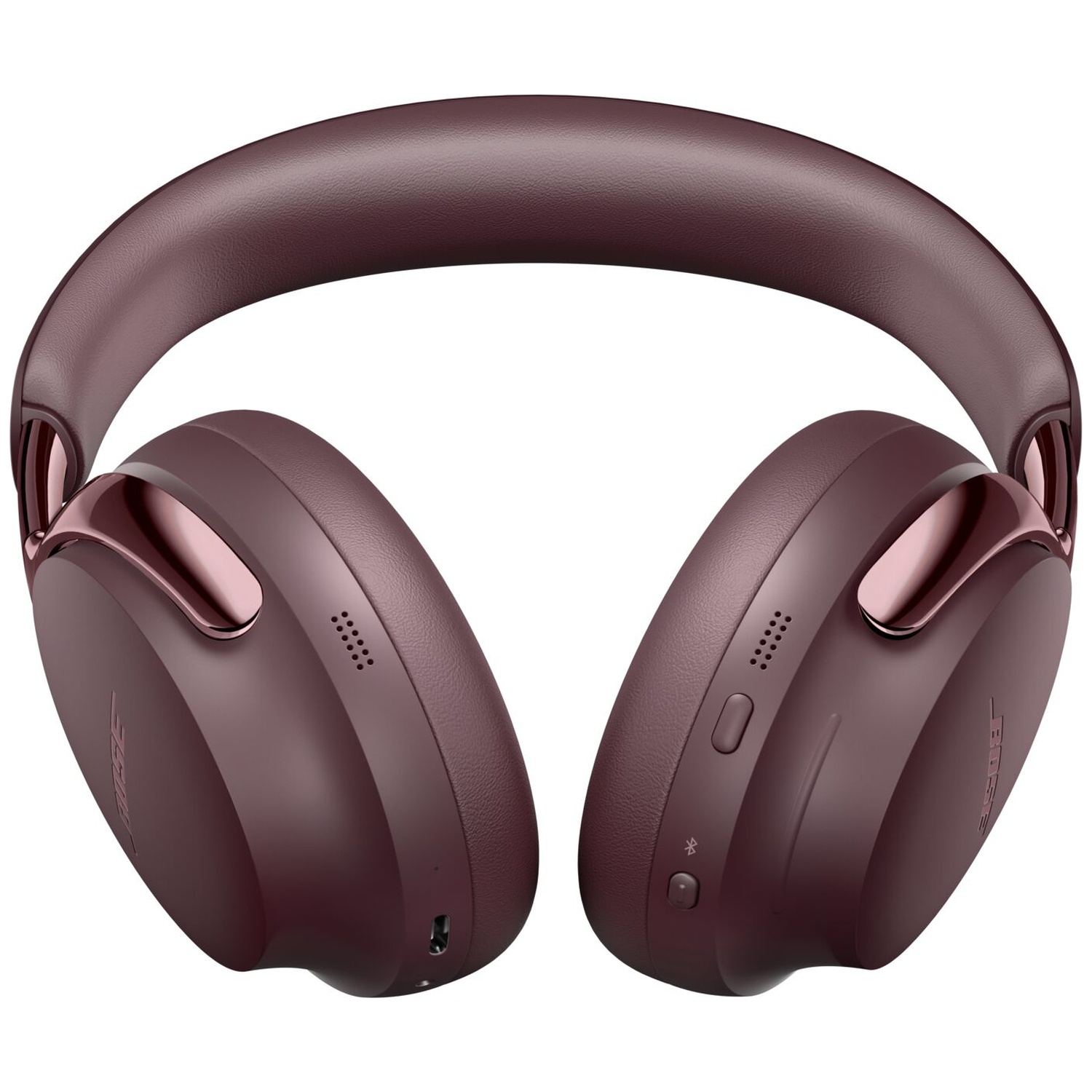 Donkerrode over-ear koptelefoon met zachte hoofdband en glanzende accenten op witte achtergrond.