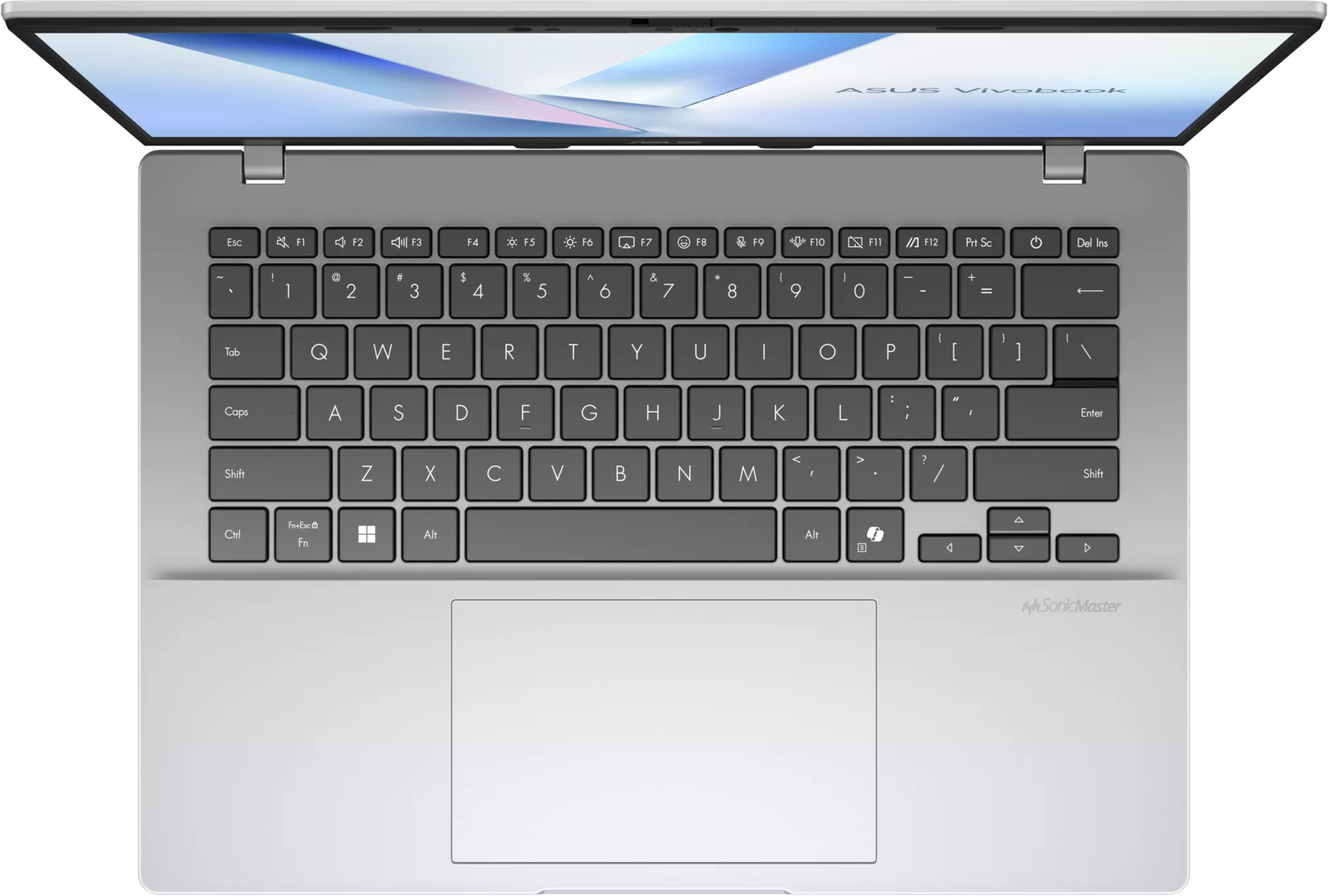 Felülnézet egy ezüstszínű ASUS Vivobookról, fekete QWERTY billentyűzettel és érintőpaddal.
