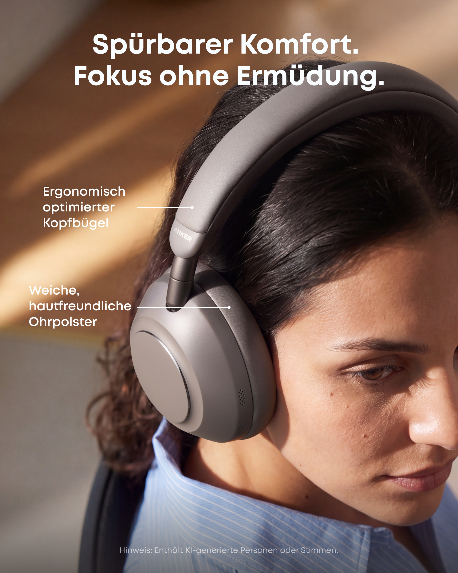 Eine Frau trägt graue Over-Ear-Kopfhörer mit deutschem Text zu ergonomischem Bügel und weichen Polstern.